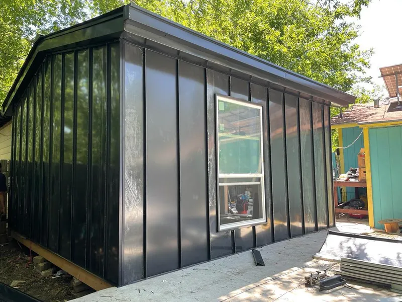 Black standing seam metal wall panels for Metal Roof Installation in Liberty